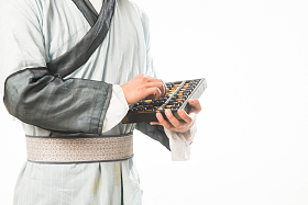 书生拿着算盘图片