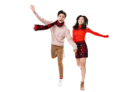 欢乐的青年情侣手牵手照片