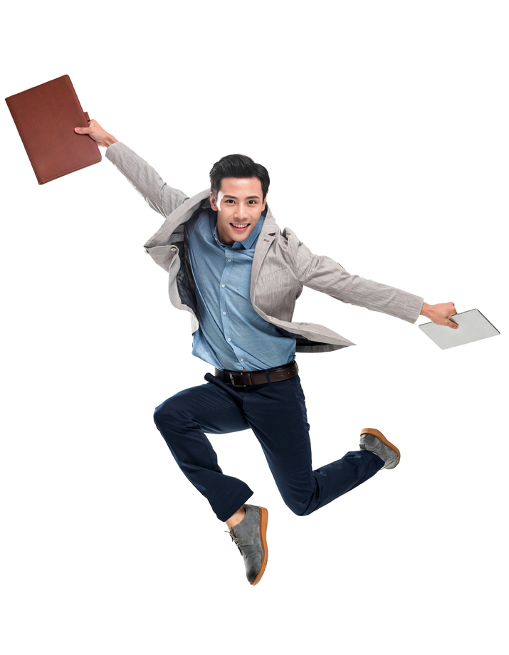 快乐跳跃的青年商务男士照片 快乐跳跃的青年商务男士照片