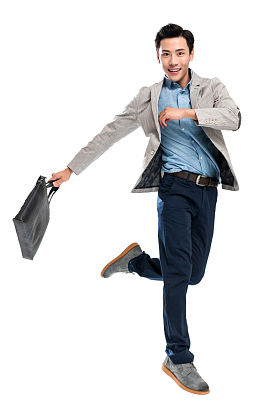 快乐跳跃的青年商务男士