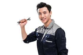 青年男修理工拿着工具图片