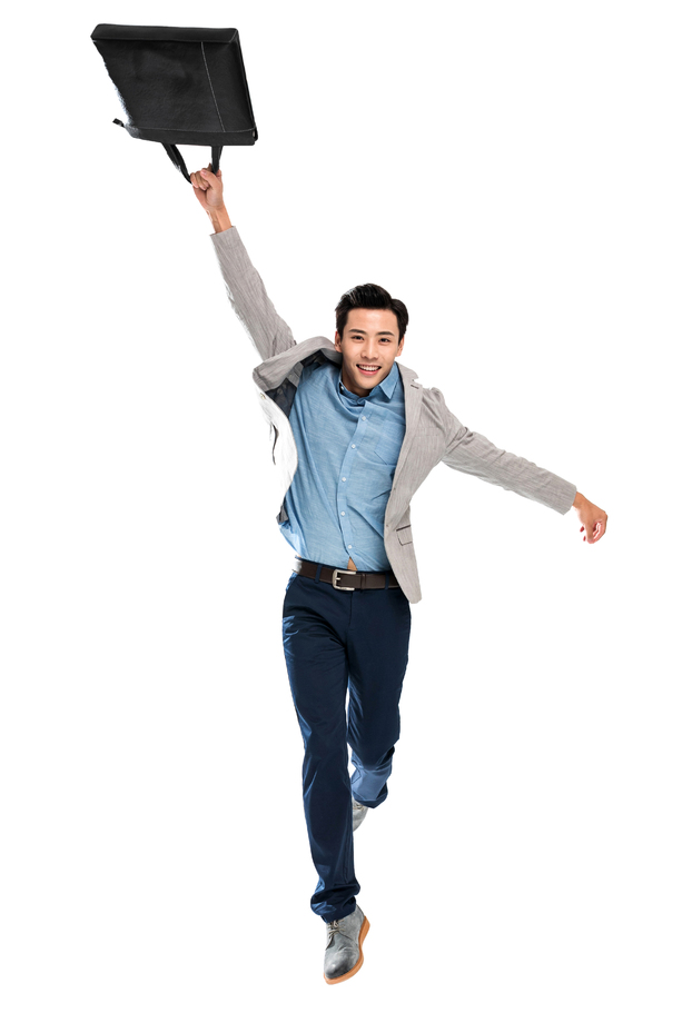 拿手提包跳跃的青年商务男士照片 拿手提包跳跃的青年商务男士照片