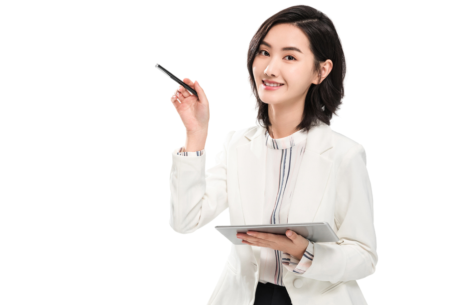 使用平板电脑的年轻女白领 使用平板电脑的年轻女白领