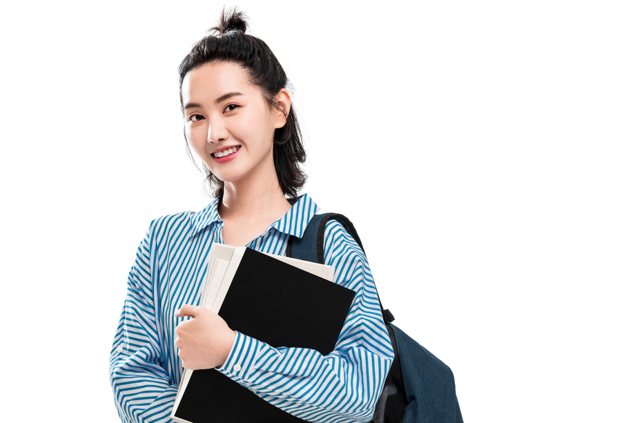 拿着书本的快乐女学生 拿着书本的快乐女学生