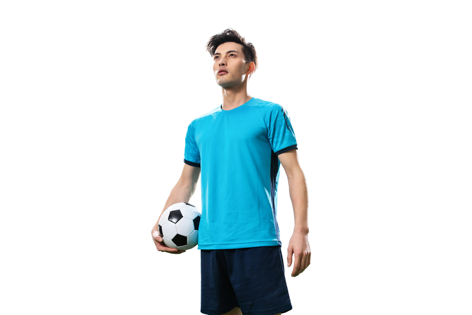 拿着足球的运动员肖像图片 拿着足球的运动员肖像图片